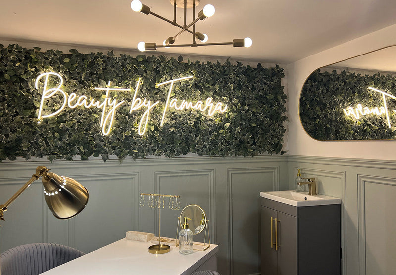 A warm white LED neon sign in a beuty salon