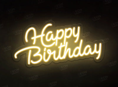 a happy birthday LED neon sign in warm white by neon daddy - the size is 60cm wide.