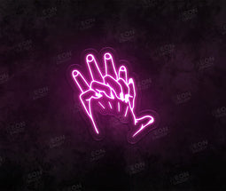 Hand Holding Neon Sign