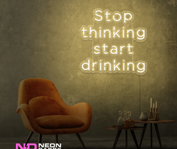 Color: Warm White Stop Thinking and Start Drinking Neon Sign